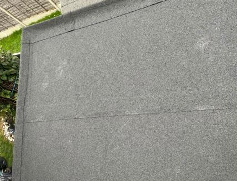 New OSB roof decking prepared for the three-layer torch-on felt system