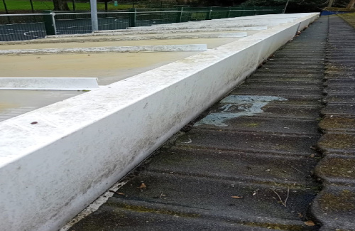 Existing tiled roof with moss and deterioration